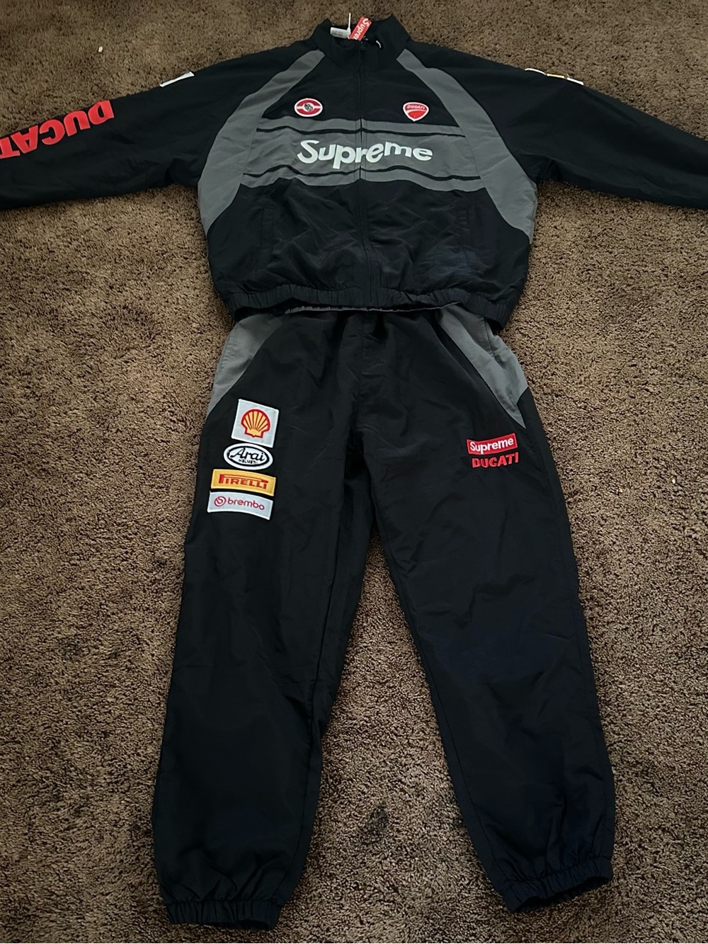 Supreme Black and Gray Racing Track Jacket & Pants Set with Red Accents
